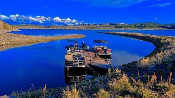 Pontoon boats ready at the dock
